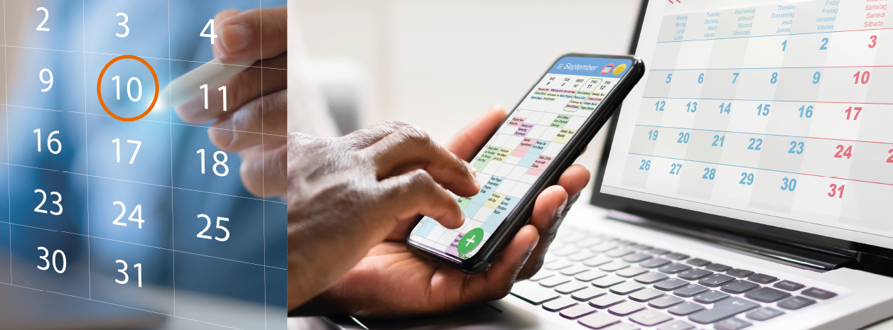 Das Bild zeigt einen Kalender, einen Laptop und ein Handy.